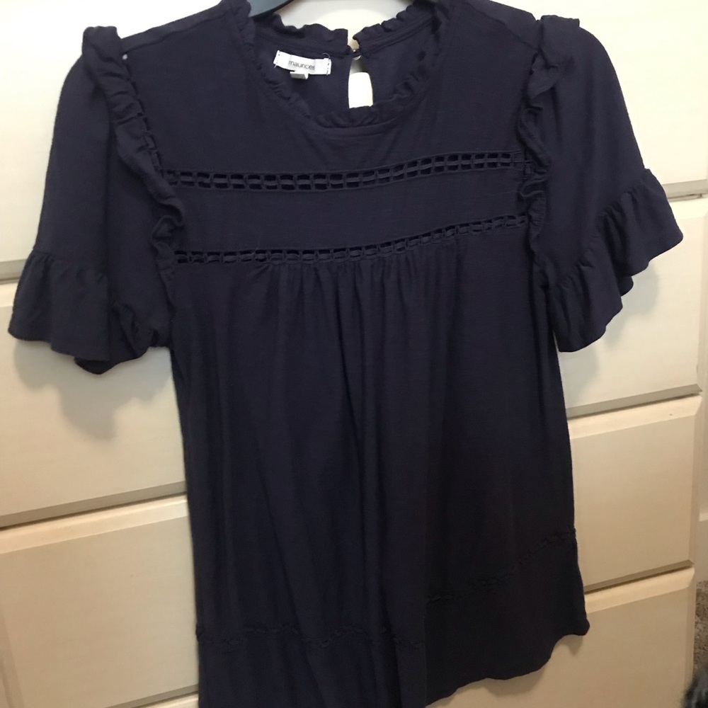 A navy blue dress shirt from Maurices. This shirt is in good condition.